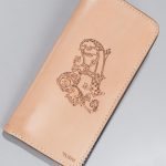 Imported genuine long leather wallet in nude with letter A decorative painting in Pakistan.
