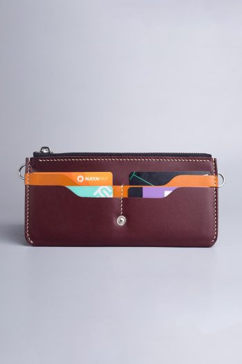 Carry on leather wallet with shoulder strap in burgundy in Pakistan.
