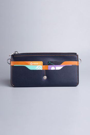 Carry on leather wallet with shoulder strap in navy in Pakistan.