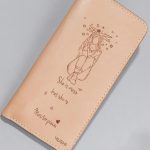 Imported genuine long leather wallet in nude with girl with planet halo painting in Pakistan.