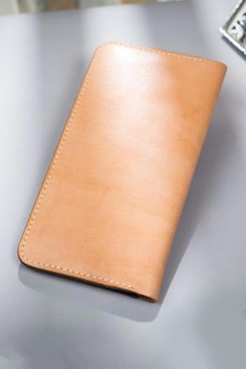 Imported genuine long leather wallet in nude with girl with planet halo painting in Pakistan.