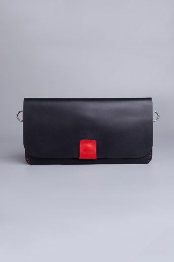 Carry on leather wallet with shoulder strap in black in Pakistan.