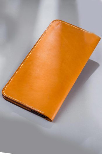 Imported genuine long leather wallet in beige with girl on a swing painting in Pakistan.