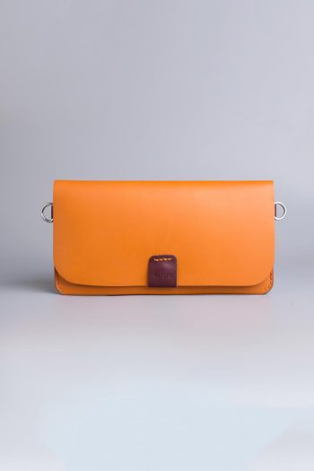 Carry on leather wallet with shoulder strap in beige in Pakistan.