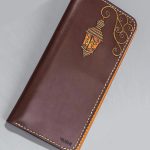 Imported genuine long leather wallet in burgundy with lantern painting in Pakistan.