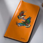 Imported genuine long leather wallet in beige with colourful birds painting in Pakistan.