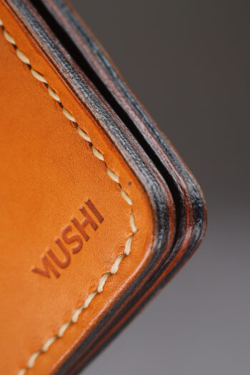 Imported genuine long leather wallet in beige with colourful birds painting in Pakistan.