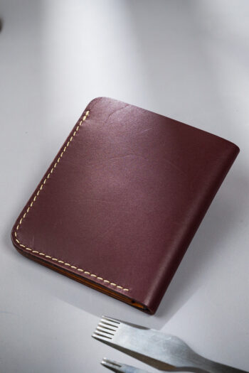Burgundy vegetable-tanned leather with a diamond abstract design.