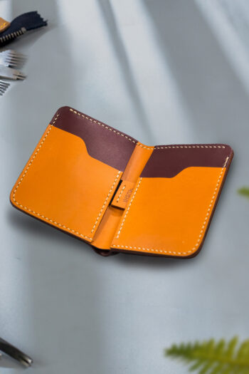 Burgundy vegetable-tanned leather with a diamond abstract design.