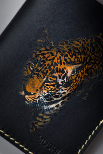 Genuine minimalist leather wallet with pull-out strap in black with fierce leopard painting in Pakistan.