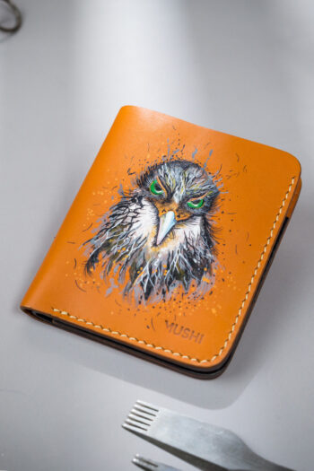 Genuine minimalist leather wallet with pull-out strap in beige with hawk painting in Pakistan.