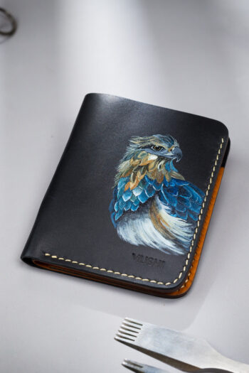 Genuine minimalist leather wallet with pull-out strap in black with eagle painting in Pakistan.