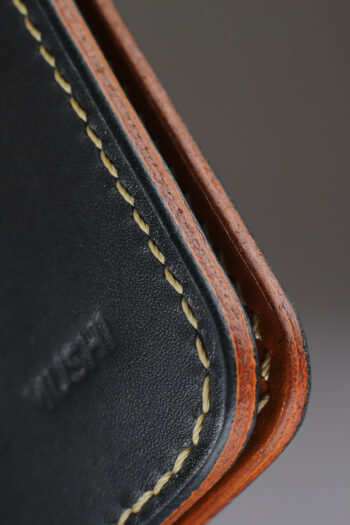 Genuine minimalist leather wallet with pull-out strap in black with eagle painting in Pakistan.