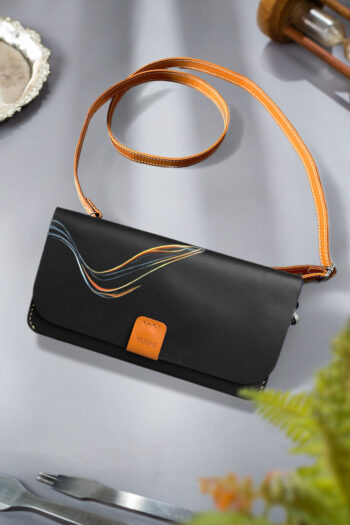 Hand-painted abstract wave design on women’s leather wallet by MUSHI.