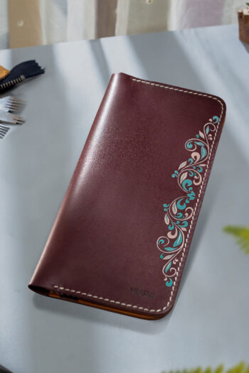 Handcrafted burgundy leather wallet with traditional motif art by MUSHI for women.