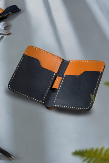 Top handmade orange and black Leather Wallet stitching by Hands