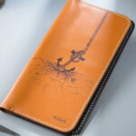 Creative Art on MUSHI Wallet in Pakistan featuring Sea Anchor Concept when submerged in Ocean Cracking the Earth surface.