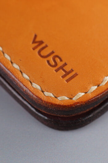 Leather orange Wallets stitched by hands by MUSHI