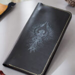 Minimalist leather wallet gift with symbolic Phoenix artwork