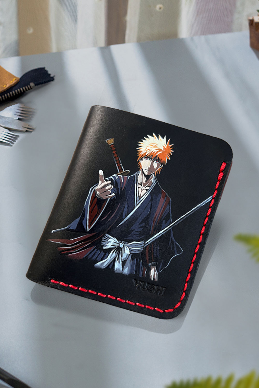 ICHIGO-KUROSAKI-Featured-Image Bleach Ichigo wallet featuring orange hair and sword artwork on genuine leather