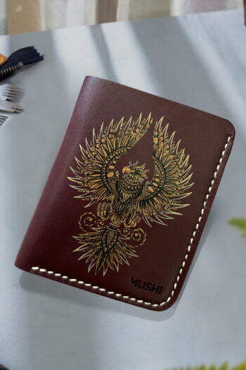 Luxury wallet handmade with hand-painted phoenix spreading spiky wings on premium leather